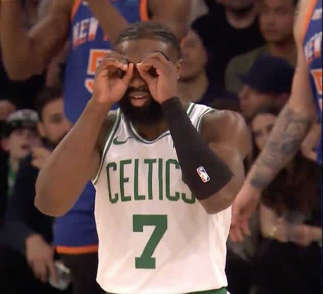 Jaylen Brown putting fake binoculars on